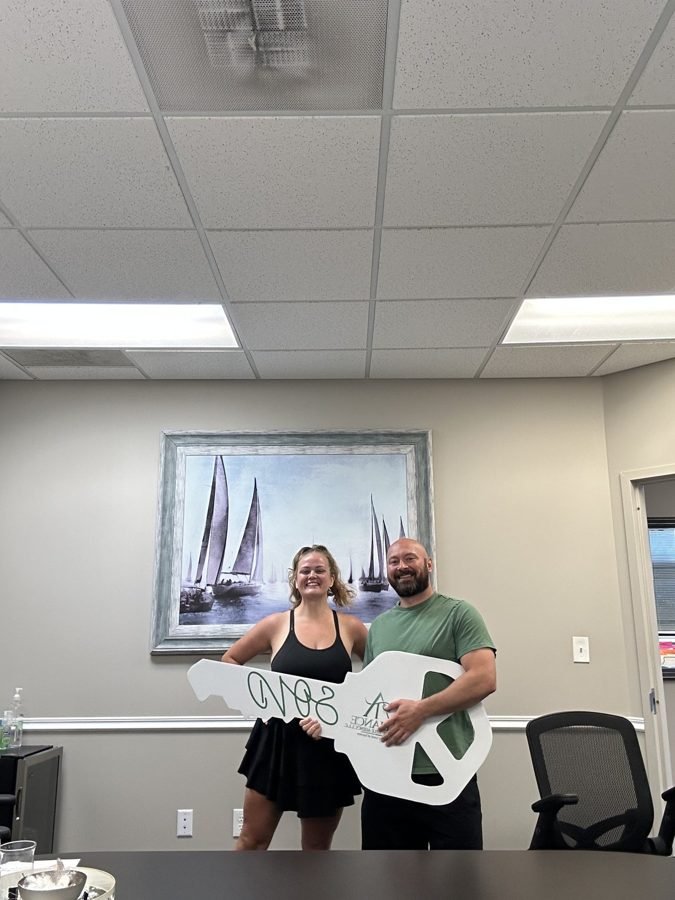 Homeowner celebrating their cash home sale