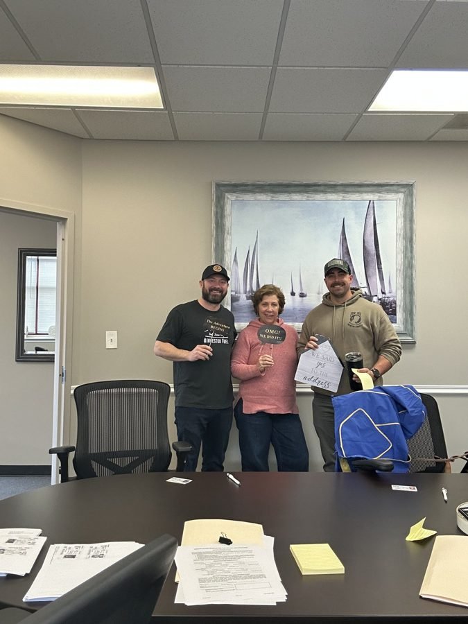 Seller signing paperwork to sell their house fast